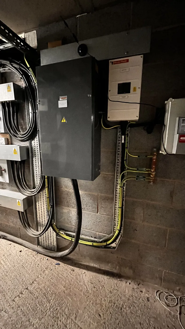 Plant room with distribution boards and cable tray