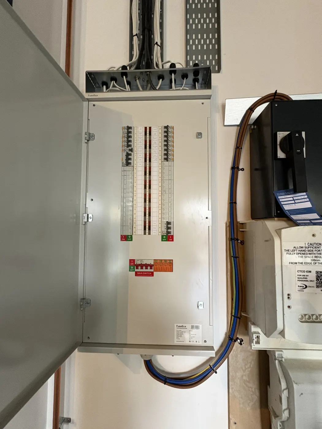 Three-phase distribution board with labelled circuits