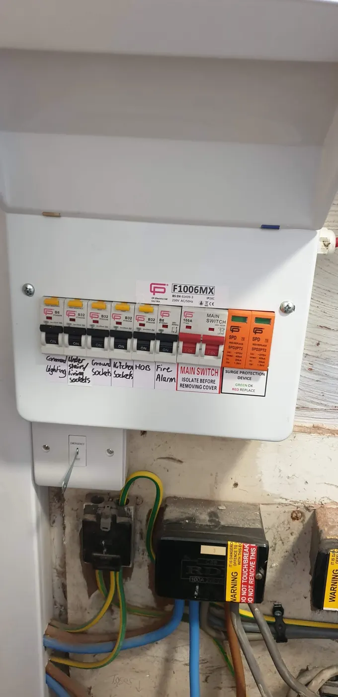 New consumer unit with RCBOs, surge protection and handwritten circuit labels