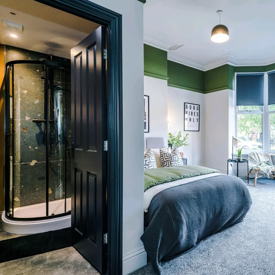 Finished bedroom with en-suite shower room, extractor fan and ceiling lights