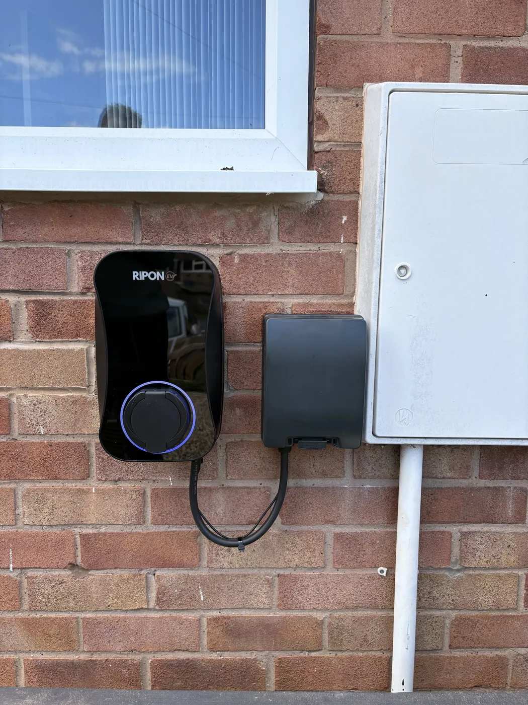 RiponEV charger with a dedicated isolator beside the outside meter box
