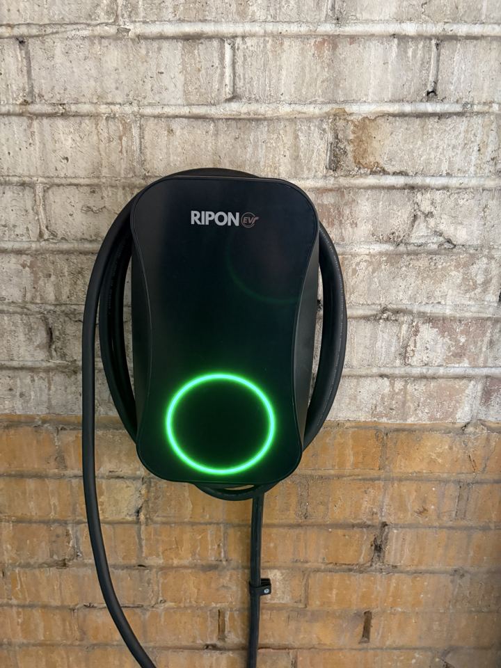 Tethered RiponEV charger with cable wrapped around it