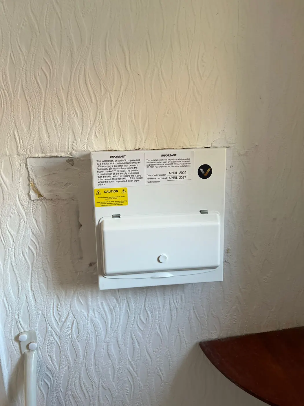New consumer unit fitted in the same spot with inspection label
