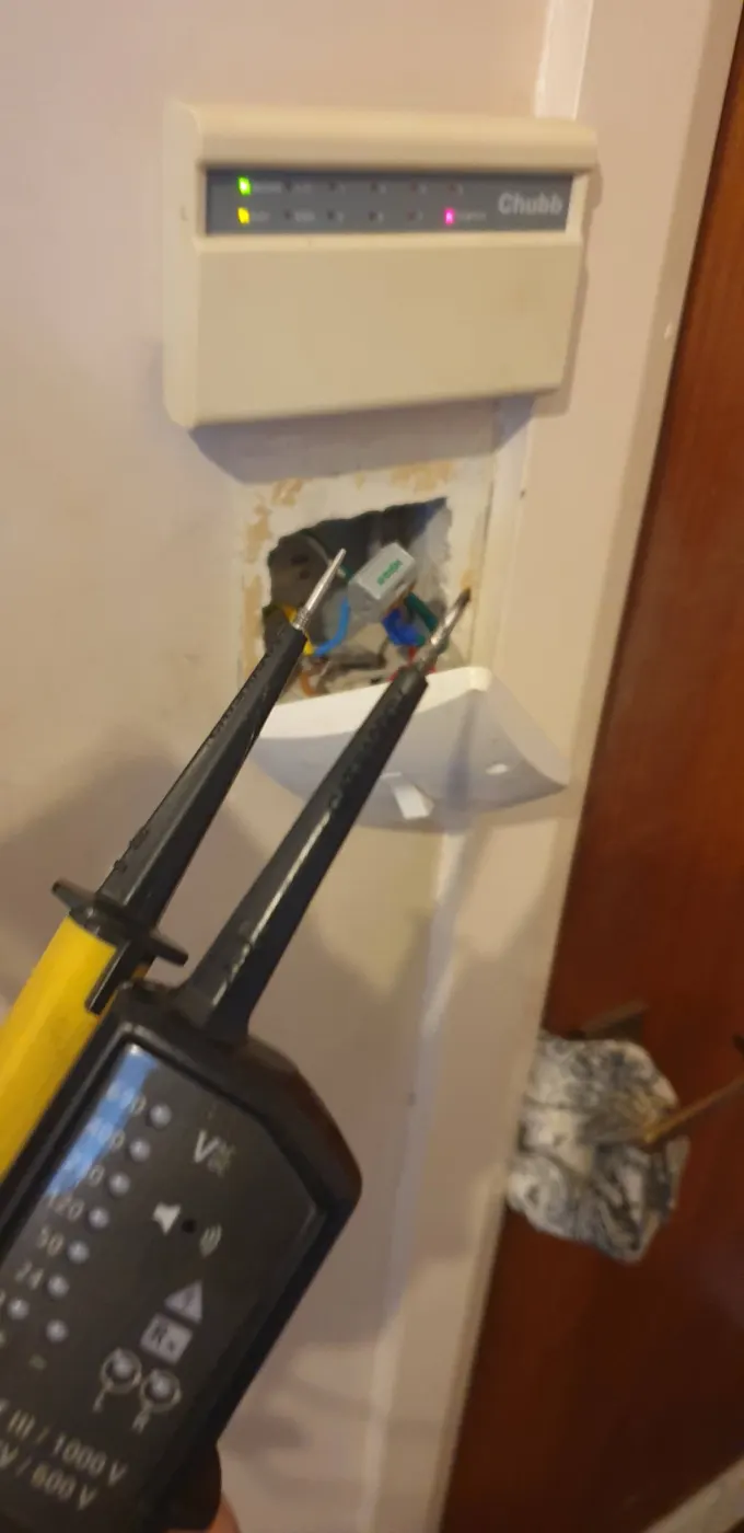 Voltage tester proving a circuit is dead before work starts