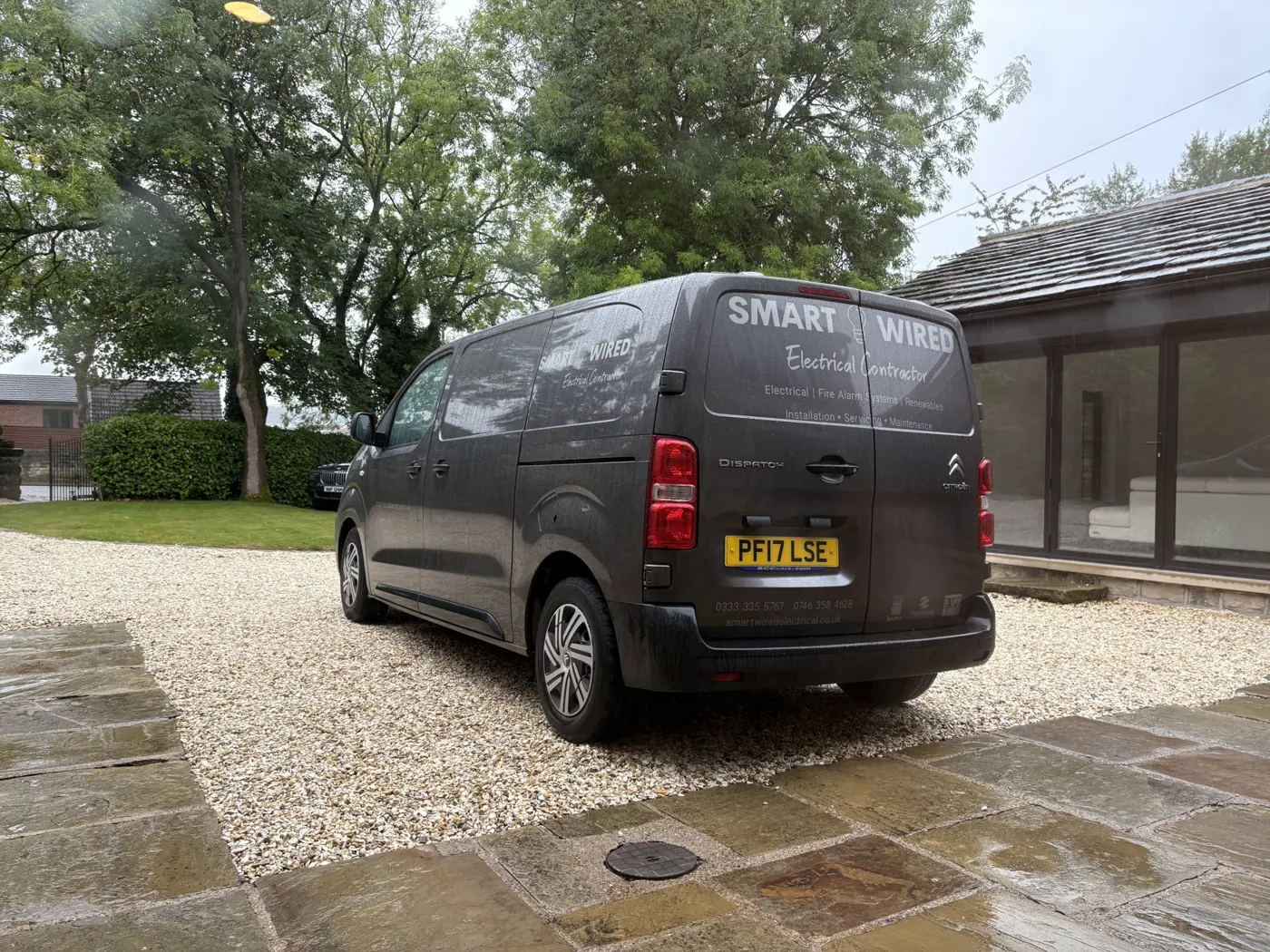 SmartWired Electrical van with phone numbers and accreditation logos