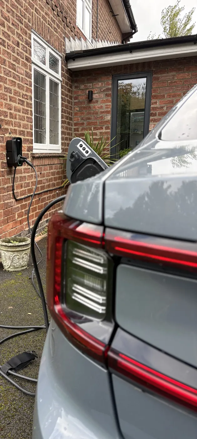 Polestar plugged in and charging from a wall-mounted RiponEV charger in York