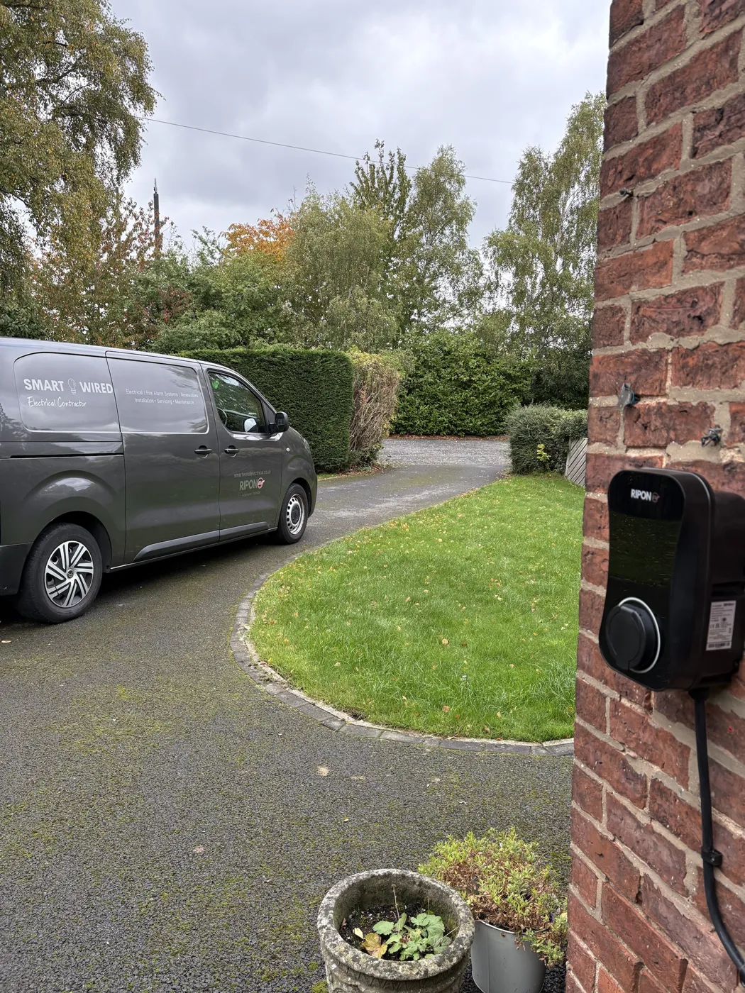 SmartWired Electrical van on the driveway next to a newly fitted RiponEV charger in York